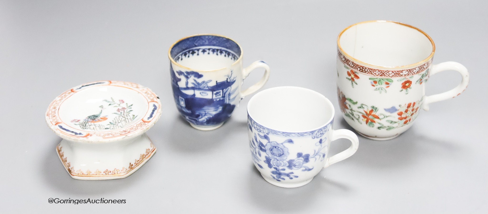 Three Chinese export coffee cups and a similar salt cellar, 18th century